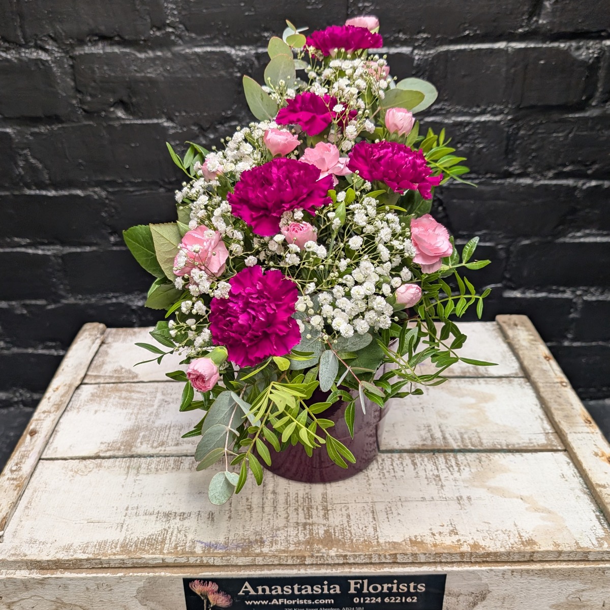 Heather Stylish Pot Heather Stylish Pot arrangement with greenery in a purple container – Anastasia Florists Aberdeen - Angle View