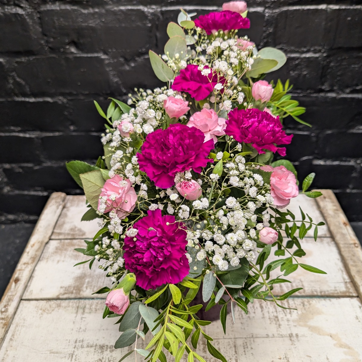 Heather Stylish Pot Heather Stylish Pot arrangement with greenery in a purple container – Anastasia Florists Aberdeen - Close Up