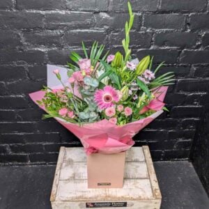 Anastasia Florists — Your Aberdeen Florist Since 1995 Medley Flower Bouquet in pink gift box with pink lilies, roses, gerberas and mixed flowers made in Aberdeen, Scotland – Anastasia Florists Aberdeen