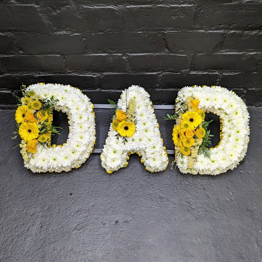 DAD funeral letter tribute in white chrysanthemums with yellow rose and gerbera sprays