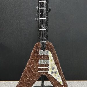 Floral guitar tribute for funeral with elegant blooms