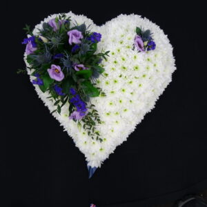 White and purple flower heart funeral tribute