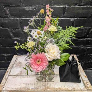 Charming bouquet in vintage-style milk bottles