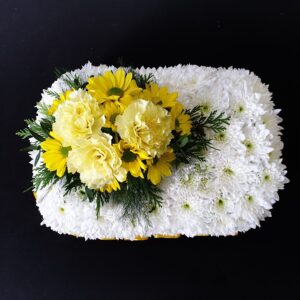 Miniature pillow with white chrysanthemums and yellow flowers