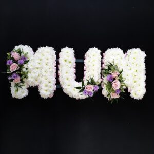 MUM funeral letter tribute with white chrysanthemums, pink ribbon edging and pink and lilac roses