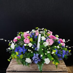 Spring garden funeral flower basket with pink roses, blue flowers, white carnations and pussy willow from Anastasia Florists Aberdeen.