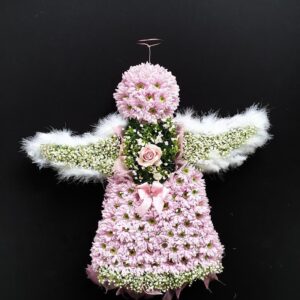 Pink angel funeral tribute made from chrysanthemums with gypsophila and feather wings, central rose and halo from Anastasia Florists Aberdeen.