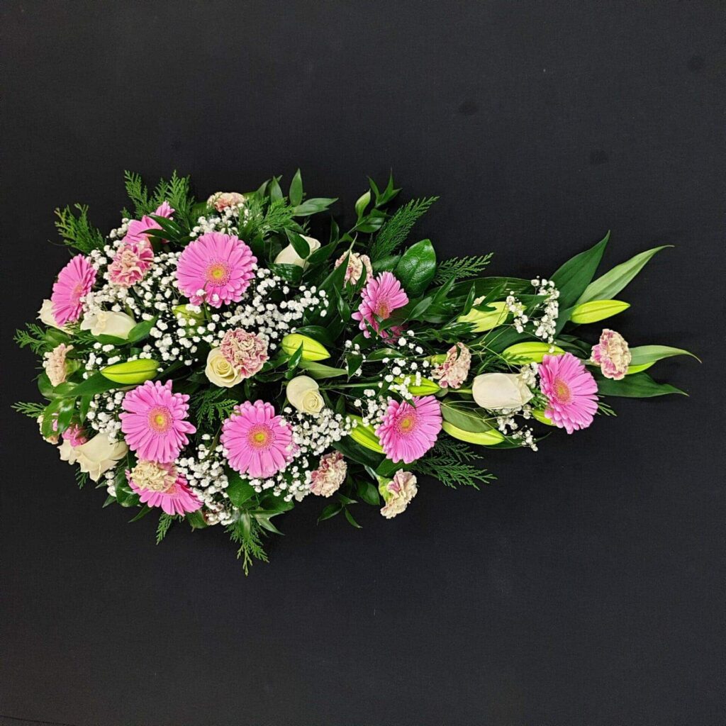Aberdeen Funeral Home Directory & Delivery Guide Pink gerbera and white rose funeral spray arrangement