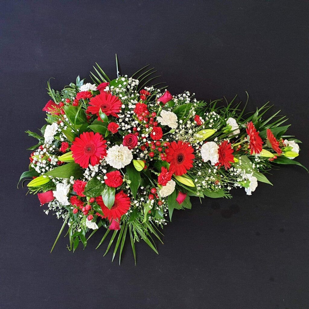 Aberdeen Funeral Home Directory & Delivery Guide Funeral spray with red gerberas, roses, and white carnations