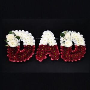 Two-tone red and white DAD funeral letter tribute with chrysanthemums and white roses