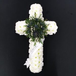 White chrysanthemum funeral cross with blue thistles and Uncle ribbon