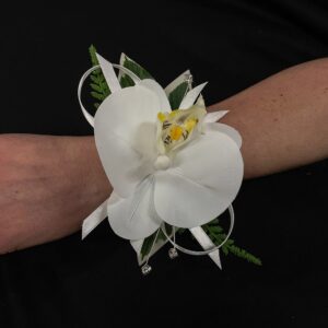 White wedding wrist corsage with delicate blooms