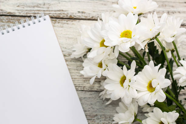 White Paper Letters with White Flowers