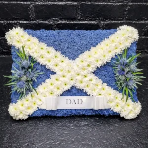 Dad Scottish flag funeral tribute in blue and white with white chrysanthemum cross