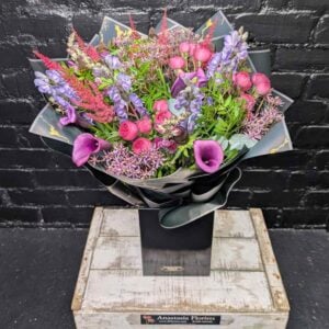 After Dark bouquet — plum calla lilies, purple monkshood and cerise roses in a black gift box, by Anastasia Florists Aberdeen