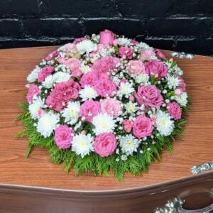 Pink Rose & Gypsophila Funeral Posy with spray carnations, chrysanthemums and gypsophila on a coffin