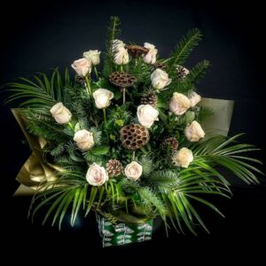Elegant Christmas flower arrangement with white roses