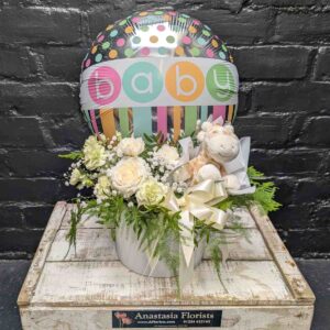 New Baby Gift Set with roses, toy, and balloon – arrangement detail