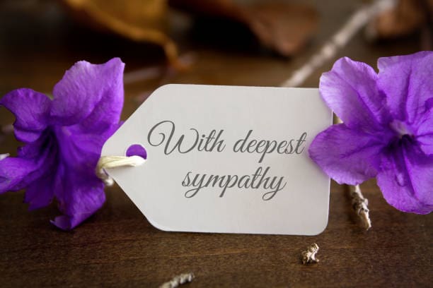 A Hand Written Sympathy Card with Lilac Flowers