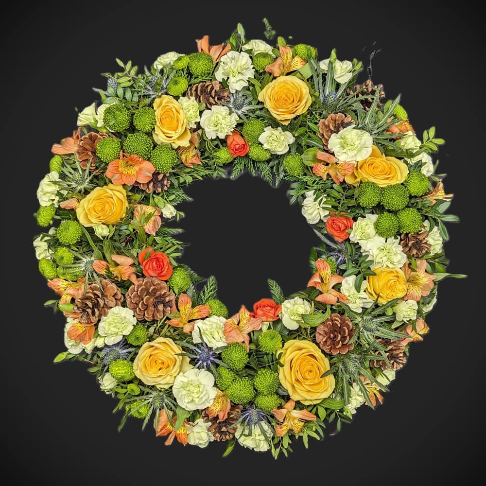 Wreath 16 1 Funeral flower wreath with yellow roses and greenery